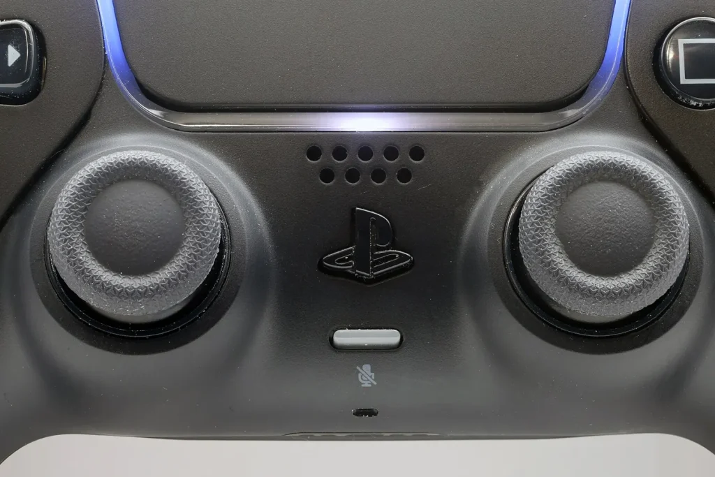 Close-up of the analog sticks on a PlayStation 5 DualSense controller