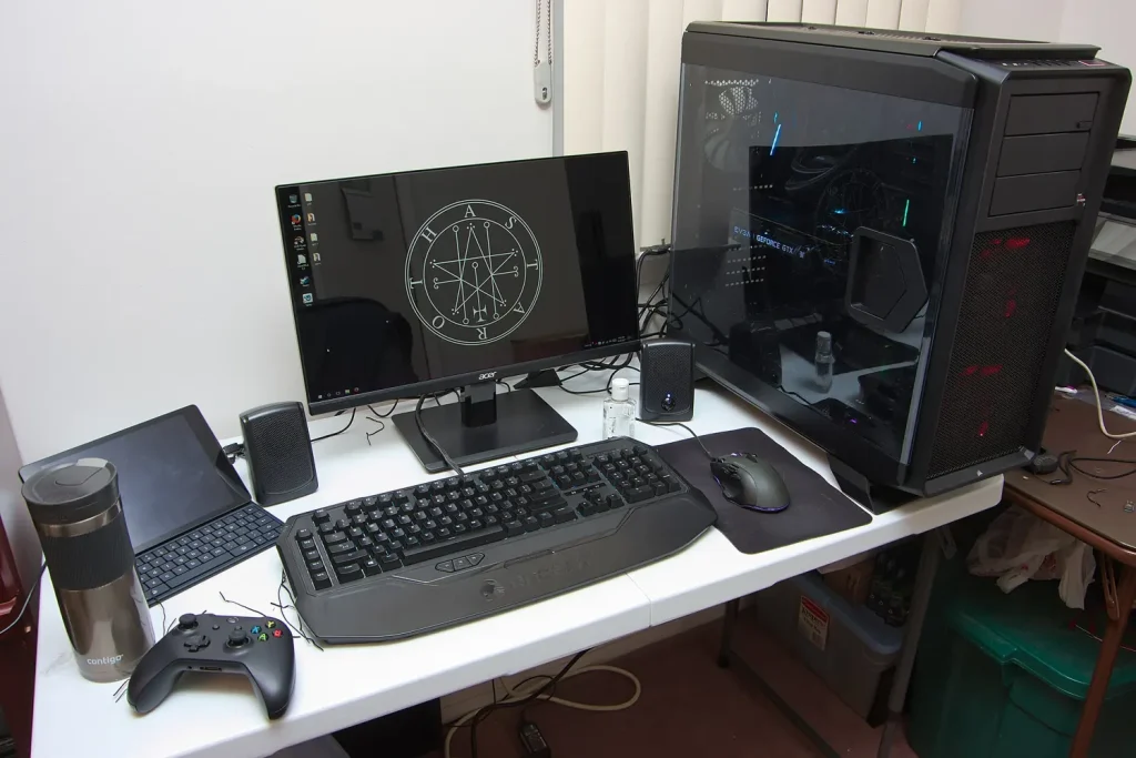 A finished gaming PC setup with monitor, keyboard and tower