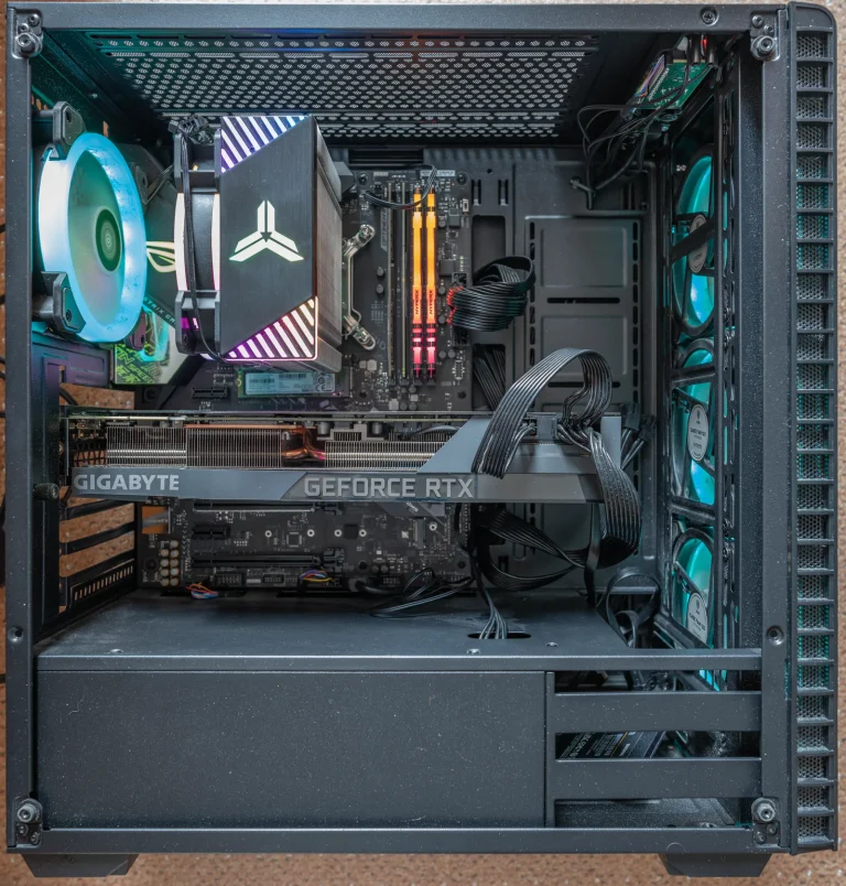 Inside a gaming PC showing the graphics card and CPU cooler