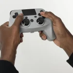 Hands holding a video game controller